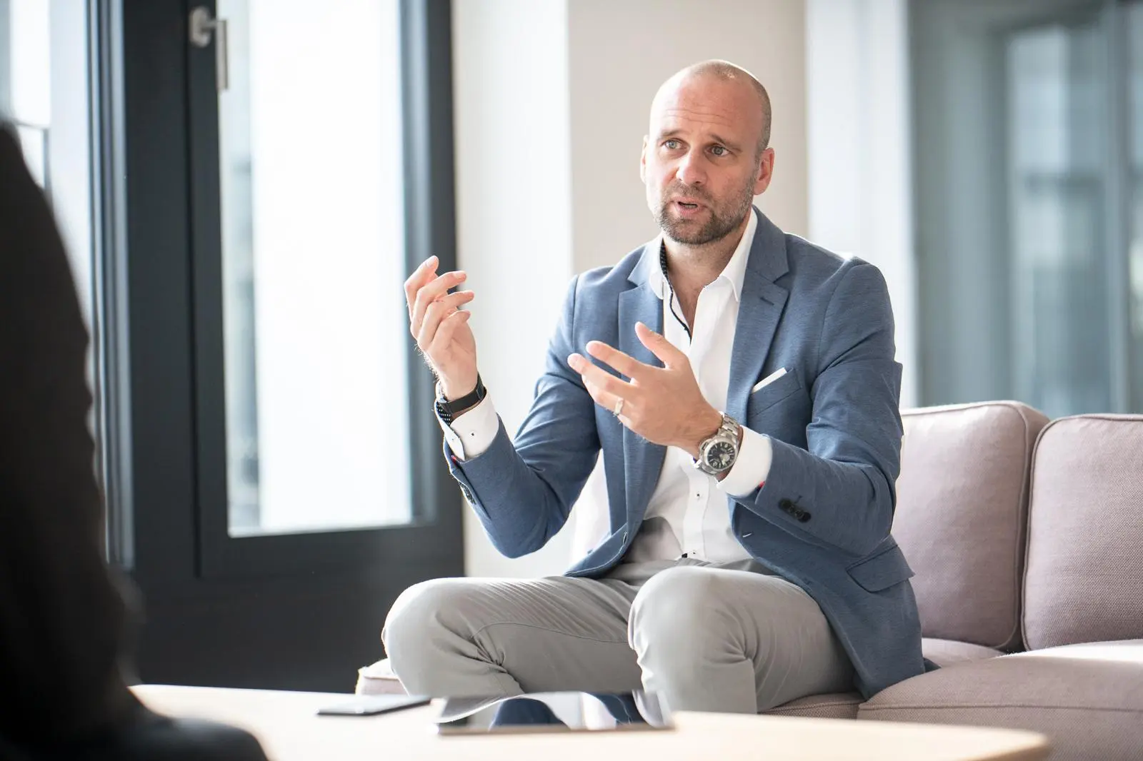 Dr. Thomas Greussing in an executive strategy conversation
